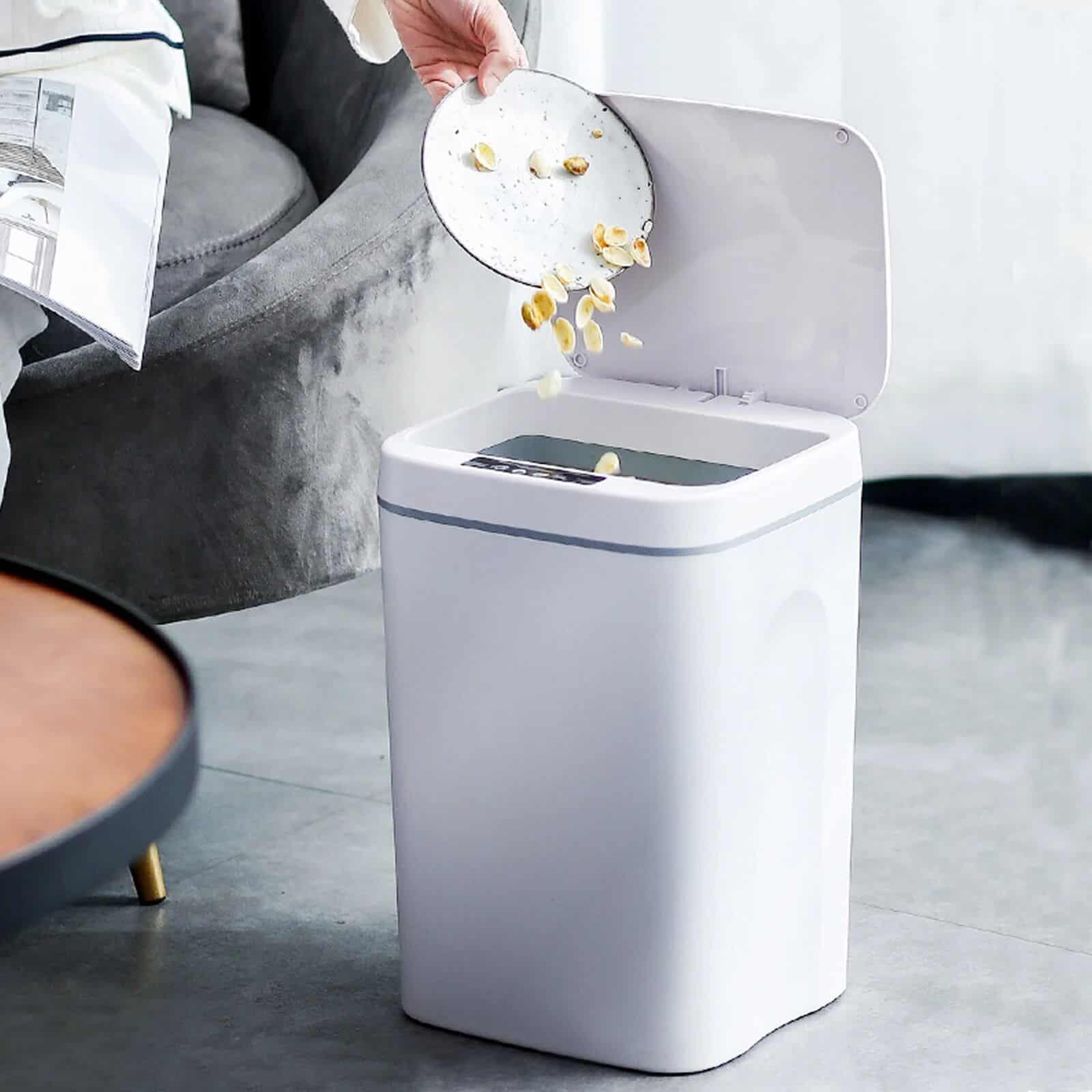 A modern, compact trash bin with a lid and auto-sensing feature, ideal for organized homes and offices. Perfect for efficient waste disposal with advanced technology.