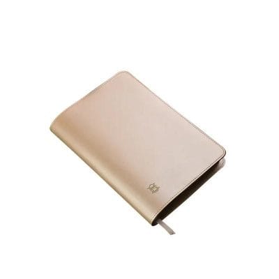 Stylish beige optometry journal with professional design, perfect for clinics and eyewear professionals to organize patient records and eyewear collections.