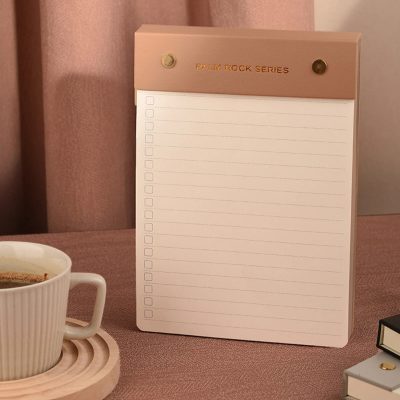 Stylish skincare notepad for beauty and wellness planning at Monalisa Medical.