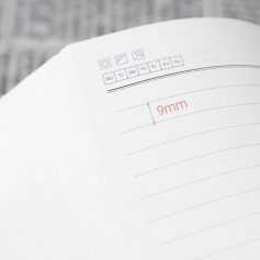 A close-up of a daily planner page showing a measurement of 9mm, with calendar icons and dates at the top, suitable for scheduling and organization in medical or optical settings.