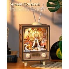 Vintage TV-shaped mini clock with colorful amusement park scene, Ferris wheel design, and decorative details. Perfect for home or office decor, combining fun and retro style.