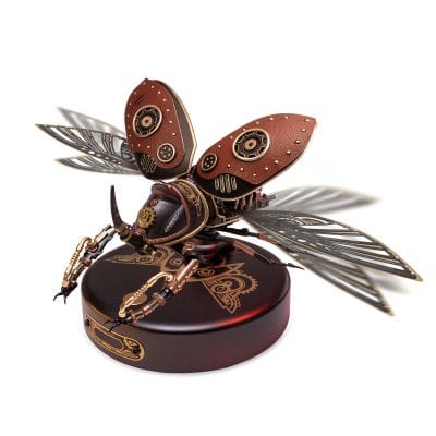 Detailed steampunk-inspired robotic insect with gears, metallic wings, and intricate design, displayed on a round base.