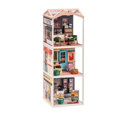 Detailed dollhouse retail display featuring various miniature store scenes, including a cozy café, a grocery store with toys, and a postal service corner, perfect for children's playrooms or collector displays.