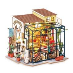 Detailed miniature flower shop with vibrant decor and tiny plants, perfect for home or office display, emphasizing flowers, gardening, and decorative craftsmanship.