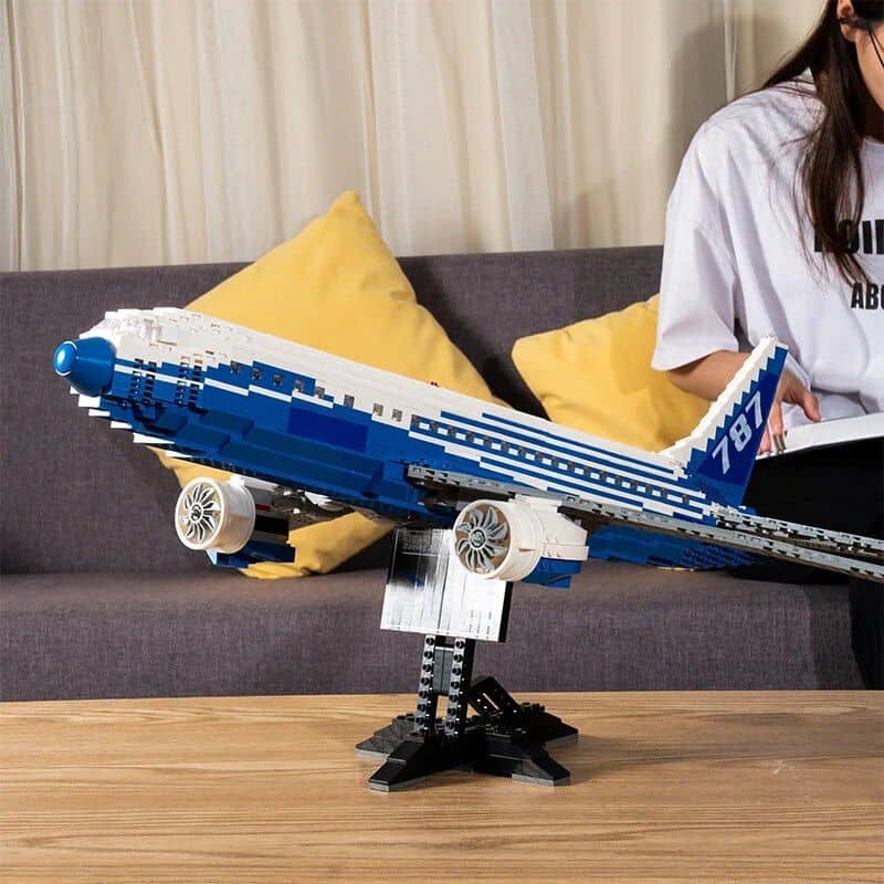 Detailed LEGO airplane model displayed on a stand with "1817" number, showcasing creative building craftsmanship associated with Monalisa Store.