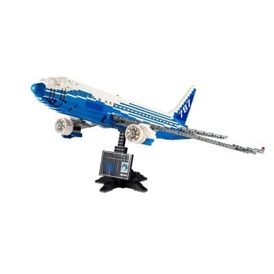 Detailed LEGO aircraft model with blue and white design, including a monitor for interactive features, perfect for aviation enthusiasts and educational展示.
