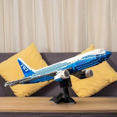 High-quality LEGO airplane model with detailed design for display, perfect for aviation enthusiasts and collectors. Ideal for home decor and educational purposes in optometry-related displays.