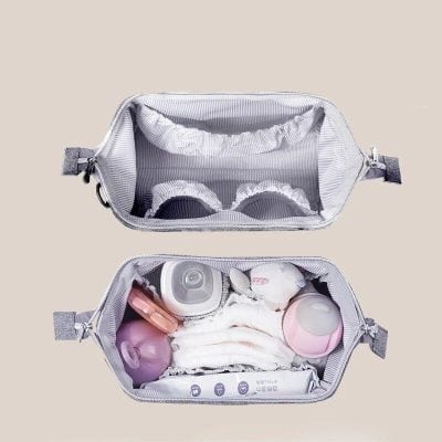 Organize baby essentials with this portable diaper bag from Monalisa Store, featuring multiple compartments for diapers, bottles, wipes, and toys for convenient travel.