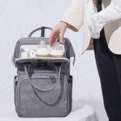 Elegant grey carry-all diaper bag with insulated bottle pockets. Perfect for moms on the go, combining functionality and style for your baby's needs.