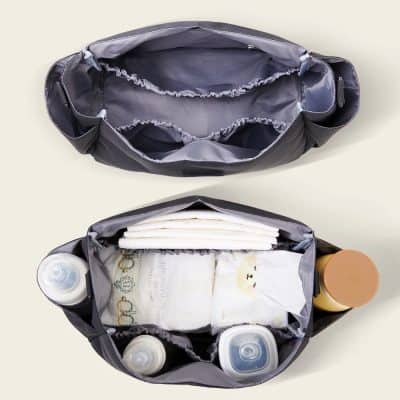 Versatile diaper bag with multiple compartments for baby diapers, bottles, and wipes. Perfect for moms seeking an organized, spacious, and stylish solution for their baby care needs.