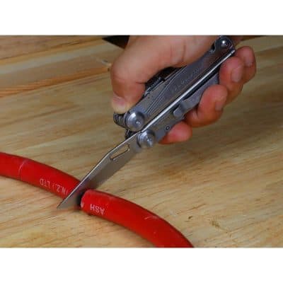High-quality multi-tool knife demonstrating sharp blade and compact design for versatile cutting applications in woodworking, DIY, and crafts at Monalisa Medical Store.
