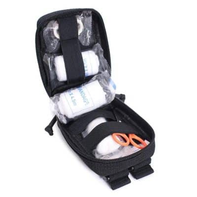 Compact medical kit for emergencies with bandages, scissors, and essentials. Perfect for home, travel, or outdoor use, ensuring quick access to first aid supplies.