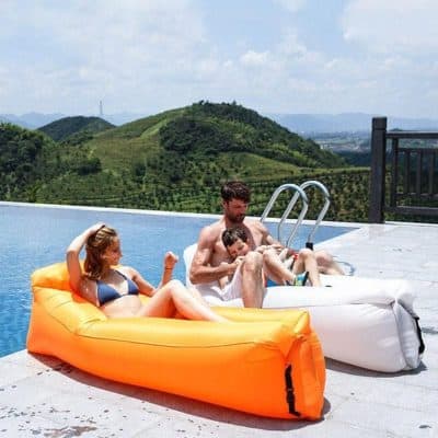 Luxury inflatable pool loungers perfect for family relaxation, outdoor poolside fun, durable waterproof material, scenic mountain view, ideal for leisure and comfort during summer vacations.