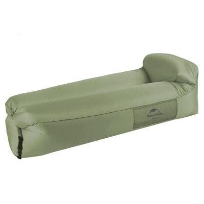 Portable inflatable lounger for outdoor relaxation and travel convenience, great for camping, beaches, and leisure activities, providing comfort and support during outdoor adventures.