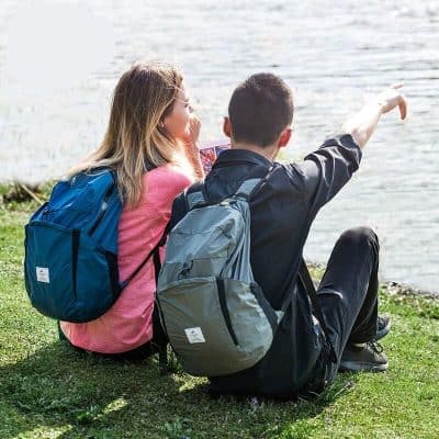 Lightweight waterproof travel backpack for outdoor adventures, hiking, camping, and daily commutes, designed for durability and style.