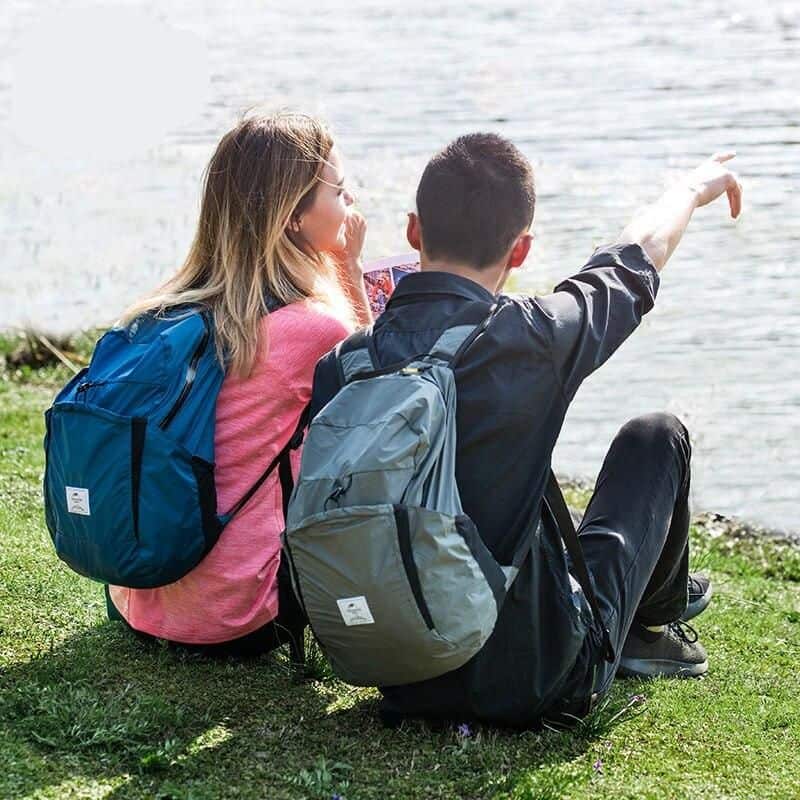 Lightweight waterproof travel backpack for outdoor adventures, hiking, camping, and daily commutes, designed for durability and style.