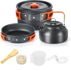 Lightweight, durable camping cookware set includes pot, pan, kettle, utensils, and accessories designed for outdoor cooking adventures and camping trips. Perfect for backpackers and hikers.
