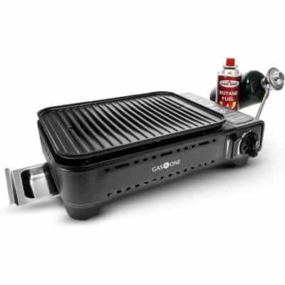 Portable gas grill with adjustable temperature control and grill rack, perfect for outdoor cooking and barbecues. Includes a butane fuel canister for convenient use.