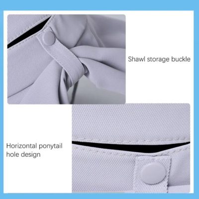 Close-up of white shirt with shawl storage buckle and horizontal ponytail hole design, showcasing practical clothing accessories for professional or casual wear.