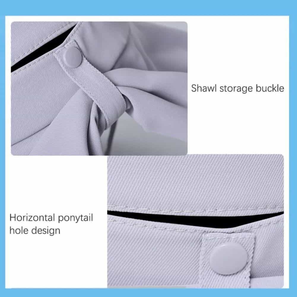 Close-up of white shirt with shawl storage buckle and horizontal ponytail hole design, showcasing practical clothing accessories for professional or casual wear.
