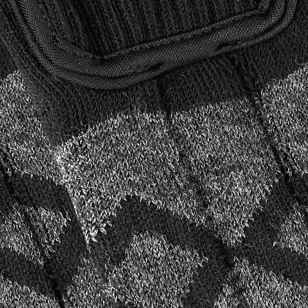 Close-up of a black luxury eye mask with detailed stitching, perfect for eye care and relaxation needs, suitable for optometry accessories.