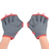 Comfortable grey workout gloves with red accents, designed for gym and sports activities for enhanced grip and protection. Perfect for weightlifting or fitness sessions.