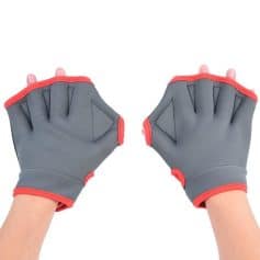 Comfortable grey workout gloves with red accents, designed for gym and sports activities for enhanced grip and protection. Perfect for weightlifting or fitness sessions.