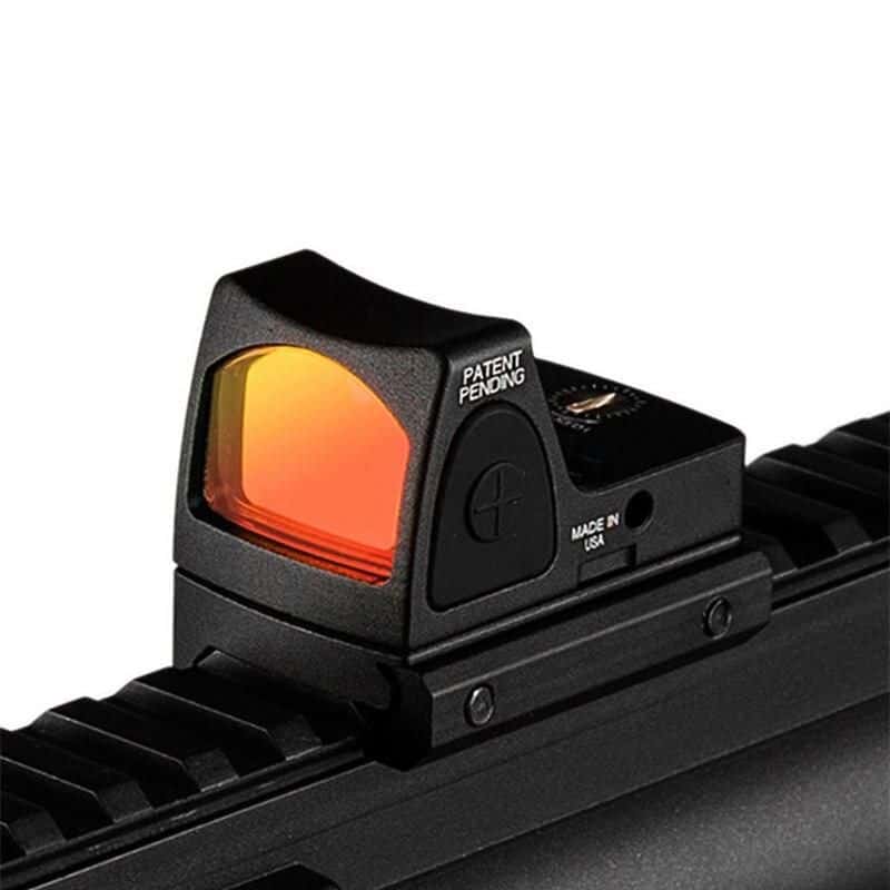 High-quality holographic red dot sight for firearms, perfect for hunting and shooting sports. Durable, easy to install, and offers quick target acquisition. Ideal for hunting and tactical applications.