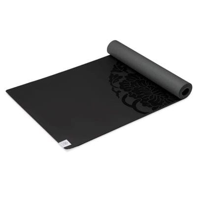 High-quality black yoga mat with floral pattern, ideal for meditation, fitness, and wellness practices. Durable, non-slip surface perfect for home or gym use.