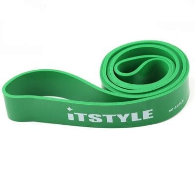 Flexible green yoga stretch band for fitness and physical therapy exercises.