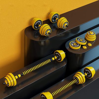 Yellow and black adjustable dumbbells and weight plates for strength training equipment.
