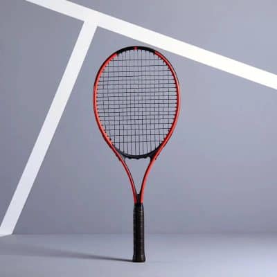 Modern tennis racket with black and red design on a minimal gray background.