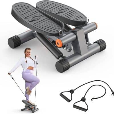 Mini stepper exercise equipment with resistance bands for cardiovascular workouts and toning muscles at home or gym.