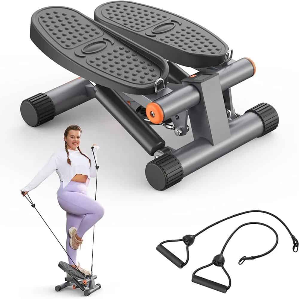 Mini stepper exercise equipment with resistance bands for cardiovascular workouts and toning muscles at home or gym.