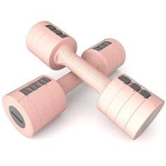 Pink adjustable dumbbells for strength training and home workouts, featuring ergonomic design and easy weight adjustment for effective fitness routines.