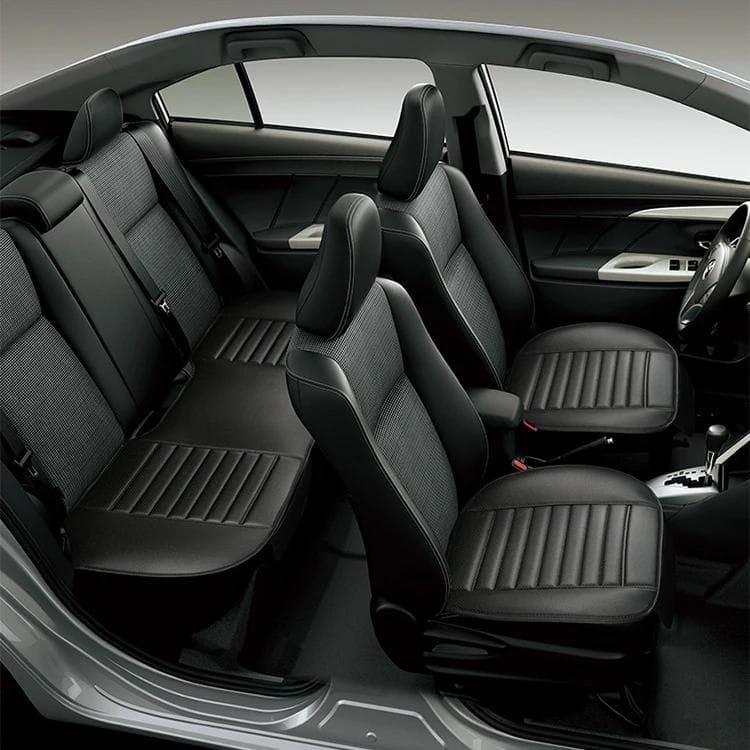 Modern car interior with black leather seats, stylish design, and spacious seating arrangements, perfect for automotive and car accessories enthusiasts.