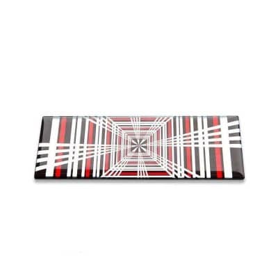 Stylish optical illusion glasses with geometric pattern, vibrant red, black, and white design, perfect for trendy eyewear collection and optical fashion accessories.