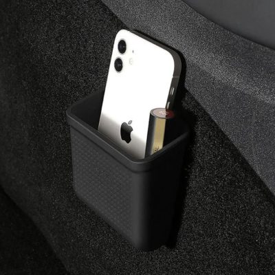 High-quality iPhone 11 in black holder with AA battery for storage or display.