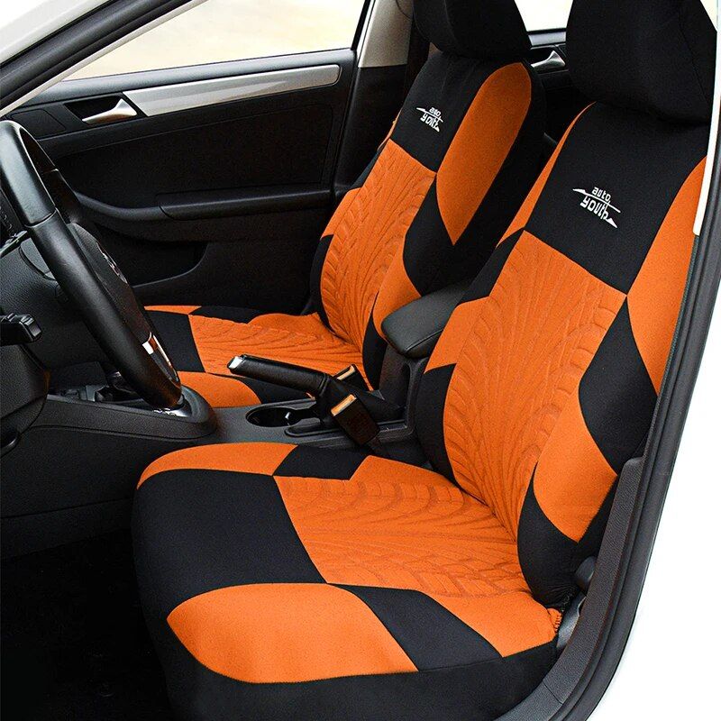 Durable black and orange car seat covers with a modern design, protecting your vehicle seats while enhancing your car's interior appearance. Perfect for driving comfort and aesthetic upgrade.