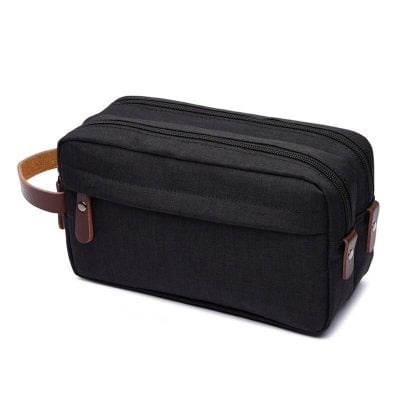 Black stylish optometry case with dual zipper and brown leather accents, ideal for eyewear storage. Compact and durable, perfect for travel and daily use.