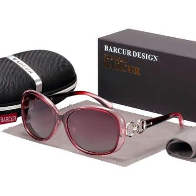 Stylish pink sunglasses with UV protection, ideal for fashion and sun safety. Includes a protective case and packaging for travel and gift-giving. High-quality optics and trendy design.