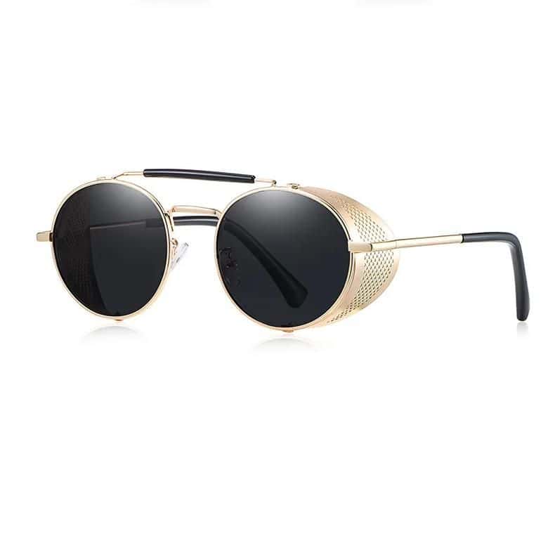 High-end designer sunglasses with stylish gold frame and black tinted lenses, perfect for premium fashion and eye protection.