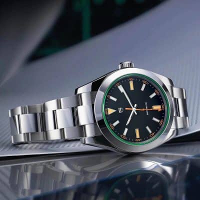 High-quality stainless steel men's watch with black dial, luminous hands, and orange accents, perfect for luxury and style.