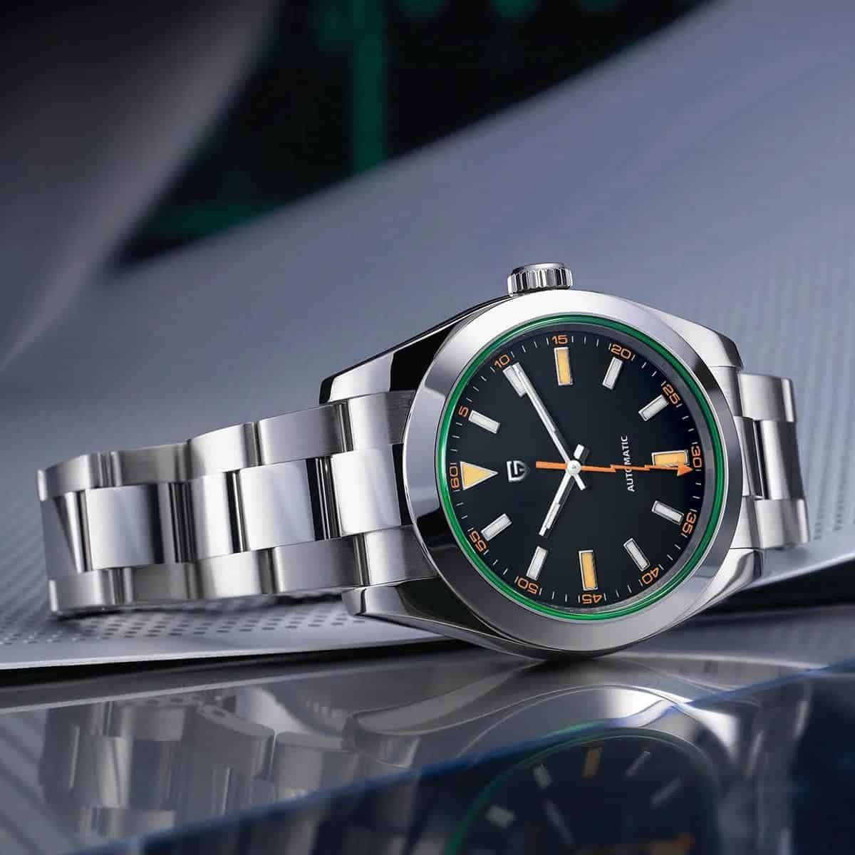 High-quality stainless steel men's watch with black dial, luminous hands, and orange accents, perfect for luxury and style.