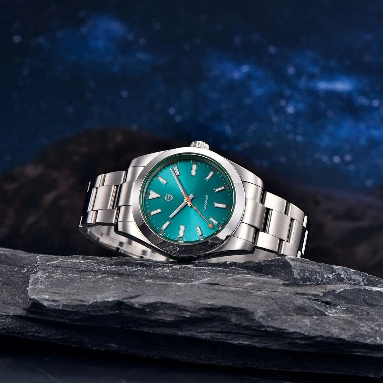 Stainless steel wristwatch with a vibrant turquoise dial, sleek design, and automatic movement, ideal for watch enthusiasts and fashion-forward individuals.