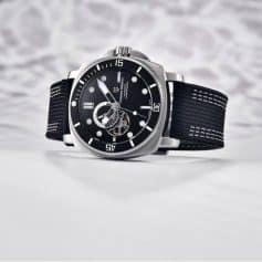 Elegant luxury dive watch featuring a black strap, stainless steel case, and precise automatic movement for men. Perfect for style and performance in water-related activities.
