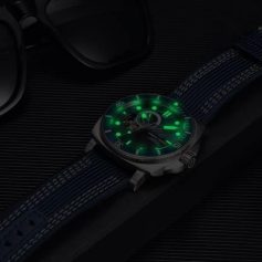 Elegant men's watch featuring a glowing green luminescent dial and durable strap, perfect for stylish accessories and timekeeping.