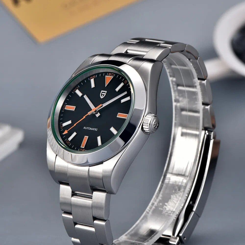 High-quality men's automatic wristwatch with silver metal strap and elegant black face, featuring orange accents and precise timekeeping.