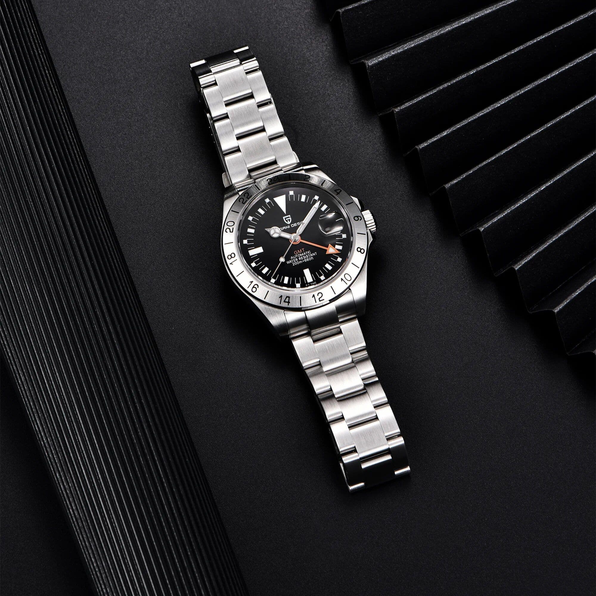 High-end stainless steel men's wristwatch with GMT function, black dial, and date magnifier, perfect for luxury watch collectors and fashion-forward individuals.