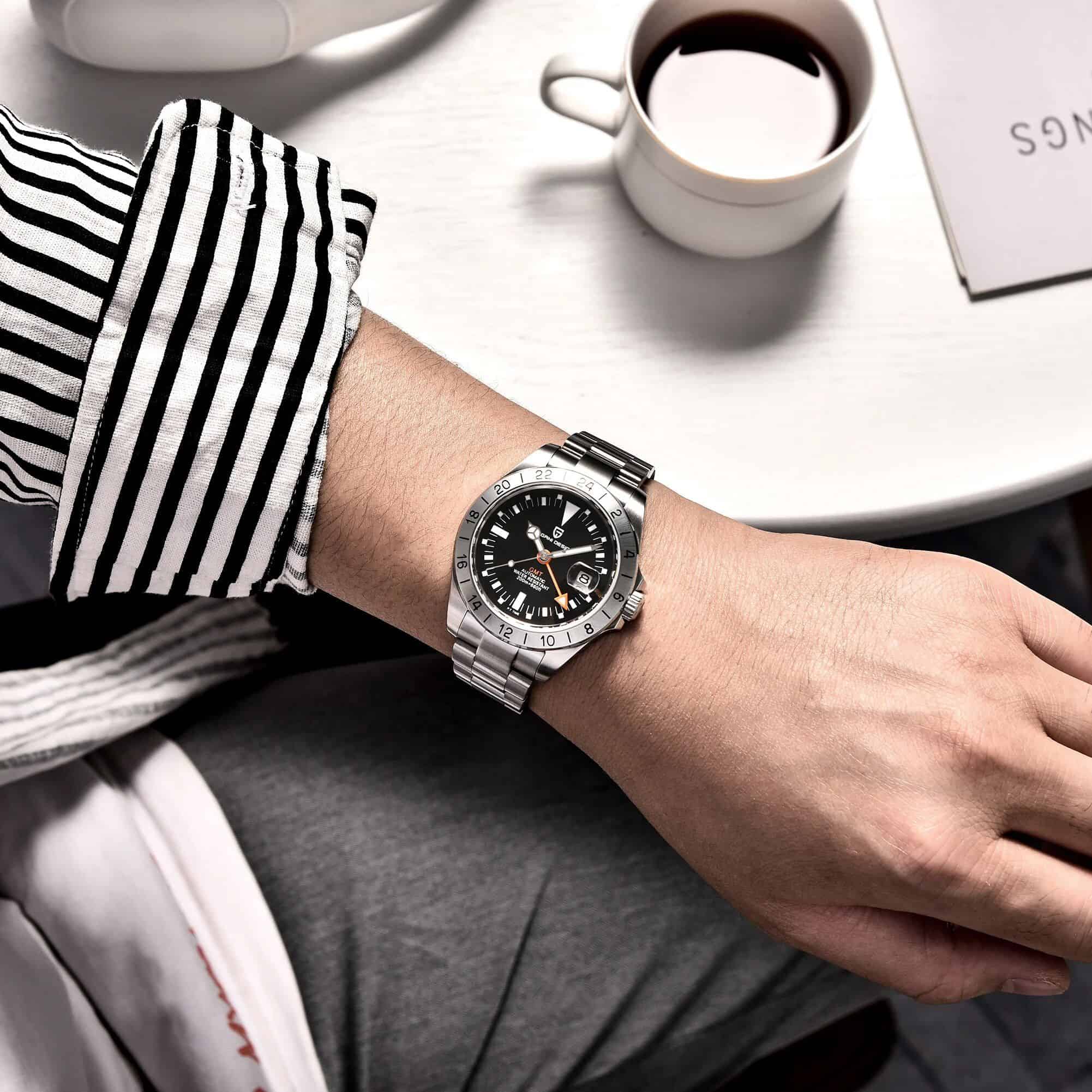 Elegant stainless steel wristwatch with black dial and GMT function by Monalisa Store. Perfect for men seeking stylish and reliable accessories.